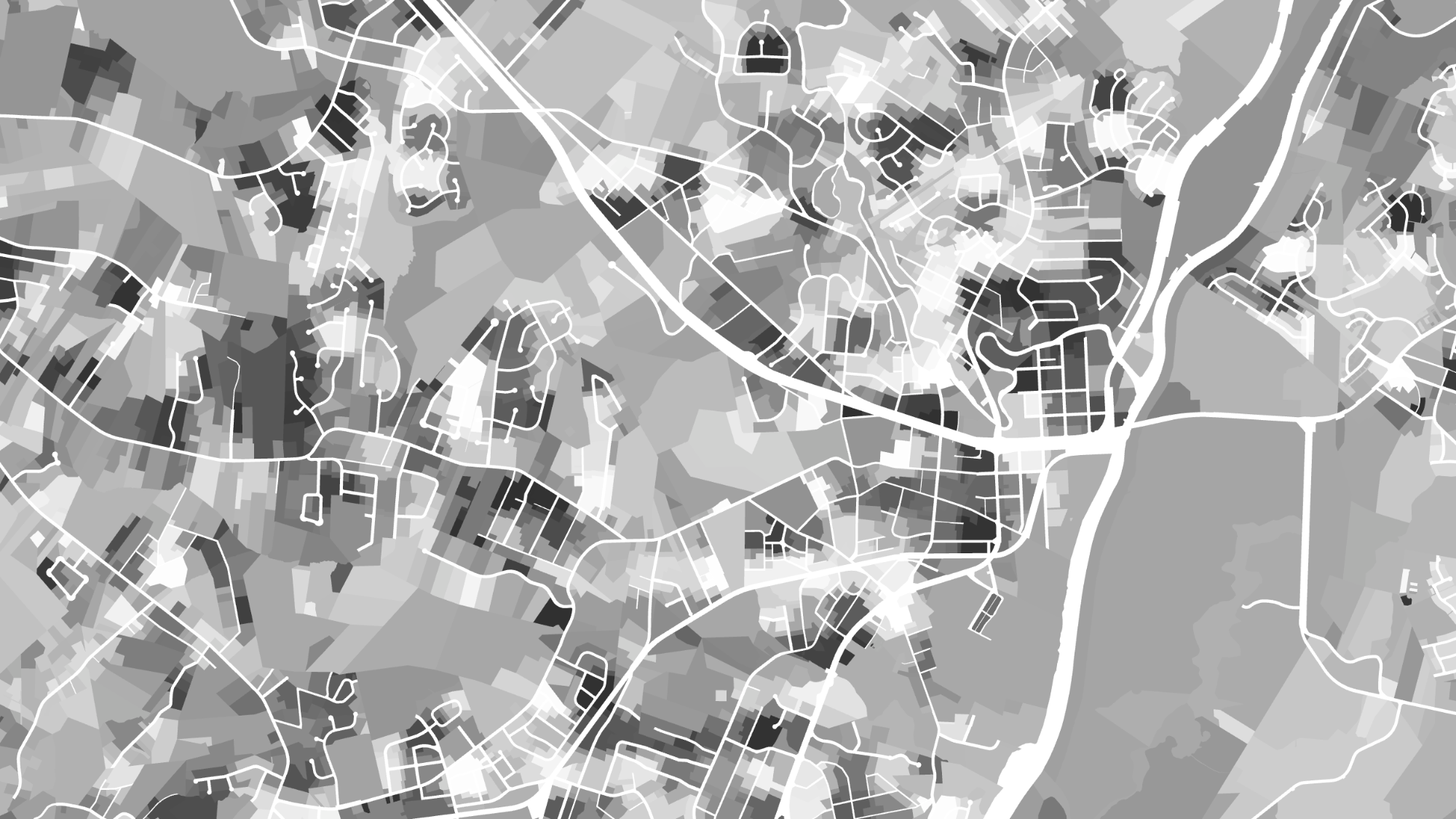 Parcel-level suitability analysis after a wildfire: parcels shaded by composite suitability score including fire boundary intersection, tree cover loss, land ownership type, and terrain characteristics